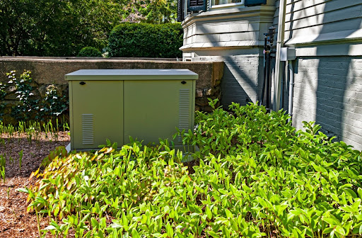 A standby generator installed outside of a home.